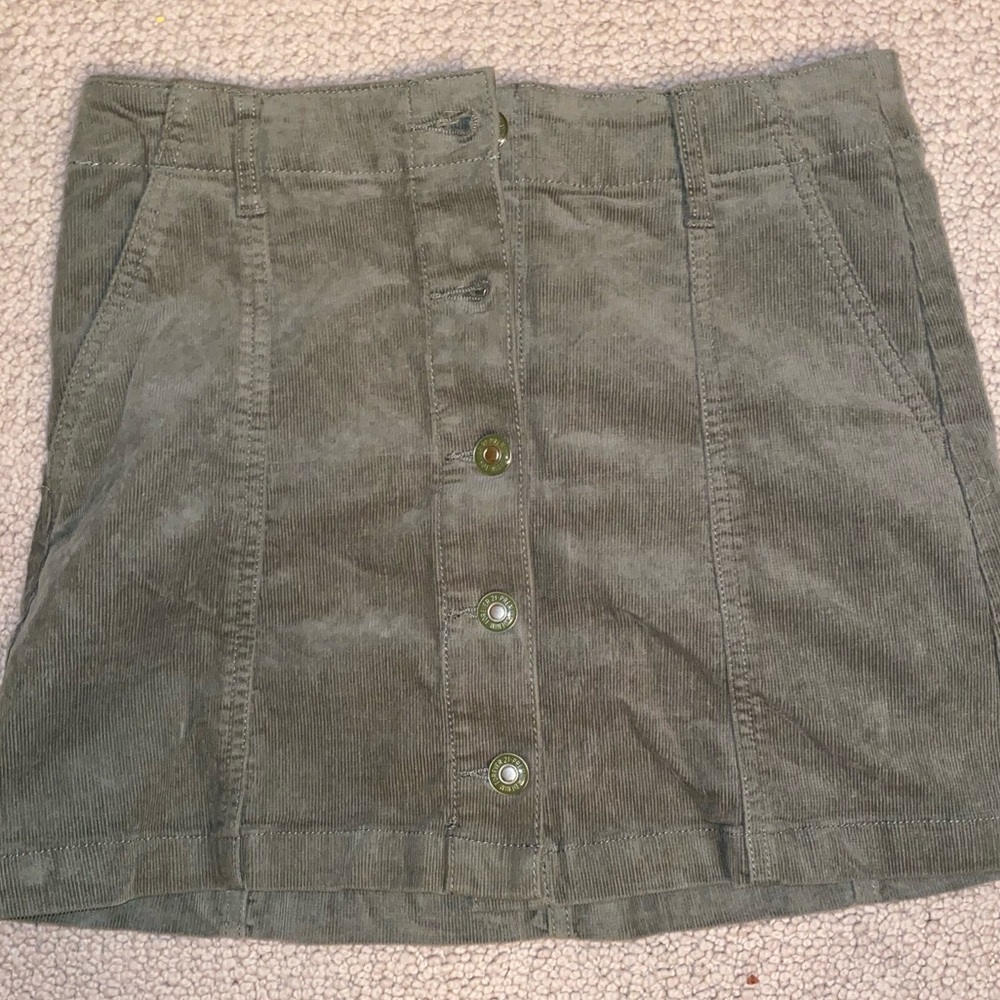 Green denim mini skirt
